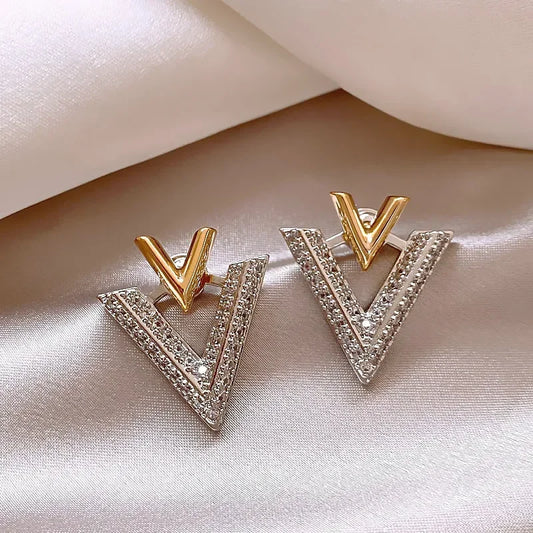 V earrings